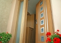ADLO - Thermo-Außenraumtür LISBEO, verglast mit Fixteil, Edelstahlleisten, ADLO Türzarge mit Holzdekor